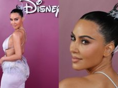 Ozdobiona strusim pierzem Kim Kardashian wdzięczy się podczas promocji serialu w Rio de Janeiro. Stylowo? (ZDJĘCIA)