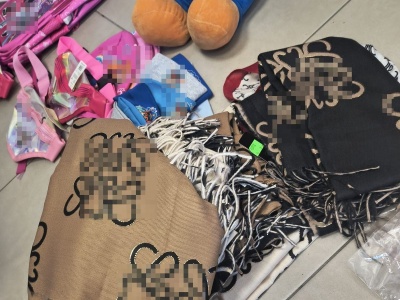 Lublin: Podrobione towary w sklepie na Czubach. Policja i służba celna zabezpieczyły produkty warte blisko 50 tys. zł