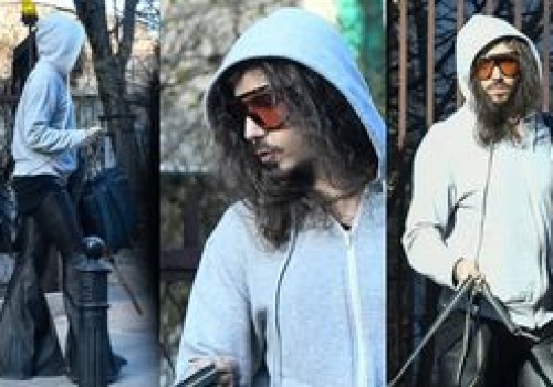 Michał Szpak w szerokich dzwonach, z wielkim plecakiem i jeszcze większym psem kręci się po mieście (ZDJĘCIA)