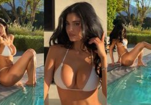 Bikiniara Kylie Jenner i jej podrasowany biust wdzięczą się nad basenem. Prawdziwa syrenka? (ZDJĘCIA)
