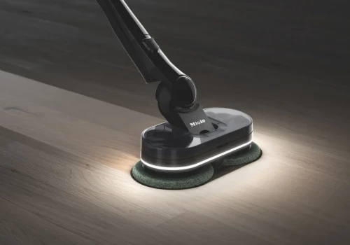 Mop schowany za pralką ma powód do niepokoju. Nowy Miele robi dwie rzeczy naraz