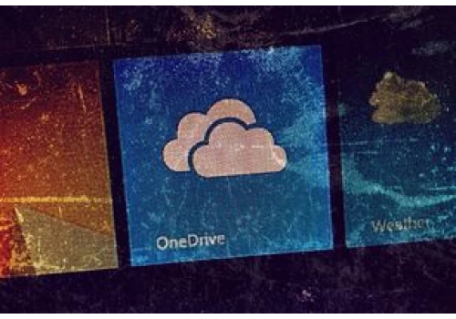 Windows 11 instaluje OneDrive Photos. Aplikacja skanuje zdjęcia