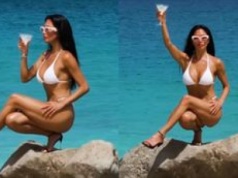 Nicole Scherzinger w białym bikini i obcasach balansuje na skale i popija martini. Robi wrażenie?