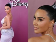 Ozdobiona strusim pierzem Kim Kardashian wdzięczy się podczas promocji serialu w Rio de Janeiro. Stylowo? (ZDJĘCIA)