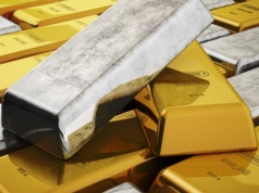 Złoto i srebro z nowymi rekordami. W tle atak na Fed