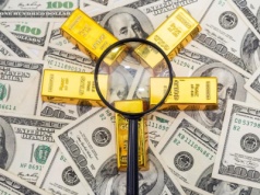 Zapaść dolara wystrzeliła notowania złota i srebra. Do poranka 200 USD na uncji