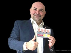 Poirytowany wicestarosta Tokarski. W tle promocja alkoholu