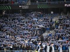 Kibice Lecha Poznań podczas meczu: "J...ć UPA i Banderę"