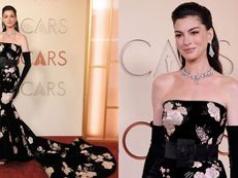 Oscary 2026. Anne Hathaway zamiata czerwony dywan kwiatową sukienką z trenem. Klasa? (ZDJĘCIA)