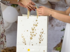 Ile dać do koperty na komunię w 2026 r.? "Komunia to nie wesele"