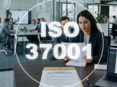 W jaki sposób standard ISO 37001 buduje transparentność i chroni osoby zgłaszające nadużycia?