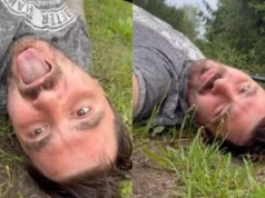Daniel Martyniuk dał kolejny POPIS. Leży na trawie, stroi miny i pokazuje środkowy palec