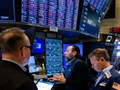 Akcje spółek z sektora chipów podniosły Nasdaq, a dane o inflacji złagodziły obawy przed podwyżką stóp